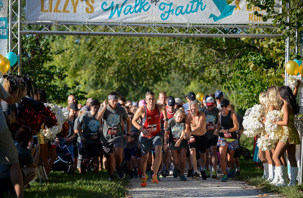 Runners take off from the start line